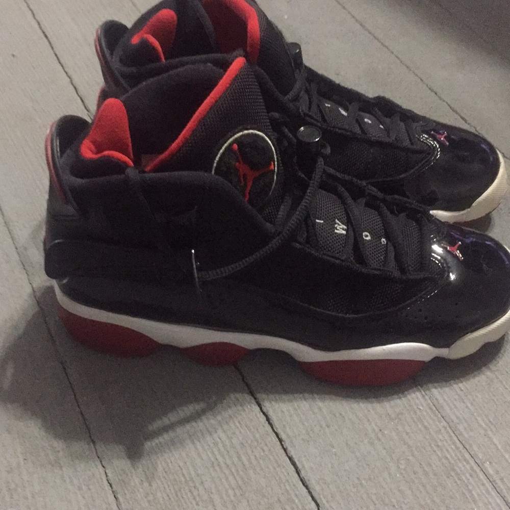 Black and red Jordan’s.